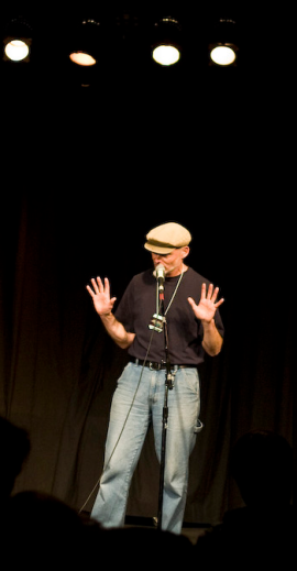 on stage at an open mic, Victoria, 2011